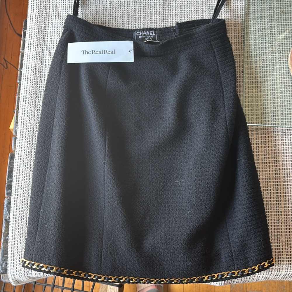 Chanel Black Skirt with Iconic Gold Chain Accents
